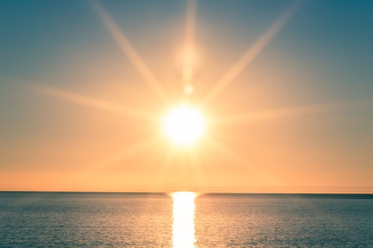 sole mare cielo durante alba, tramonto