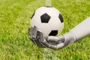 Un robot con un pallone da calcio