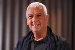 primo piano di Evaristo Beccalossi sorridente